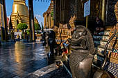 Bangkok Grand Palace,  Wat Phra Keow (temple of the Emerald Buddha). Bronze lion (singha)  statues in Khmer style guard the western entrance of the Ubosot.  